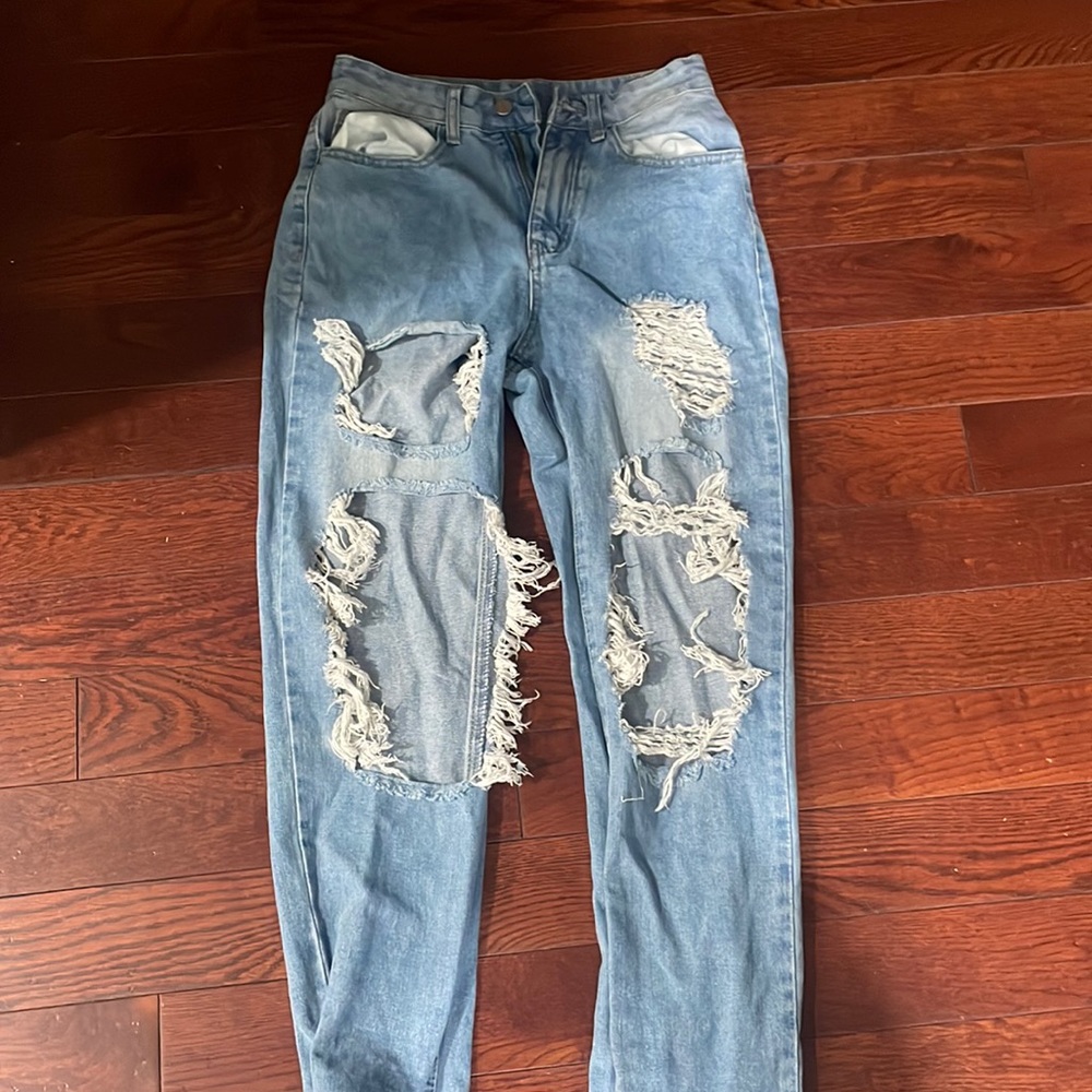 Rips. In style. Cute for an outting.